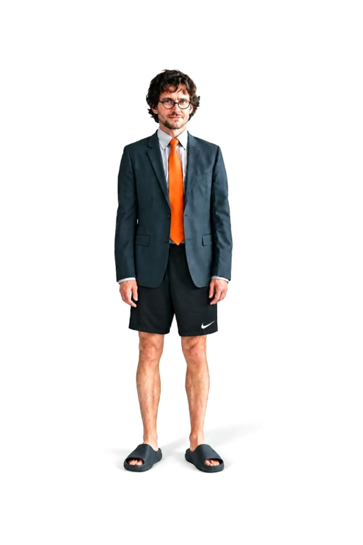 a man in a suit jacket and tie — and gym shorts and slides
